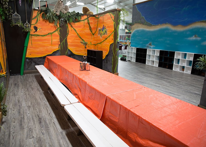 Orange party room for birthdays and events